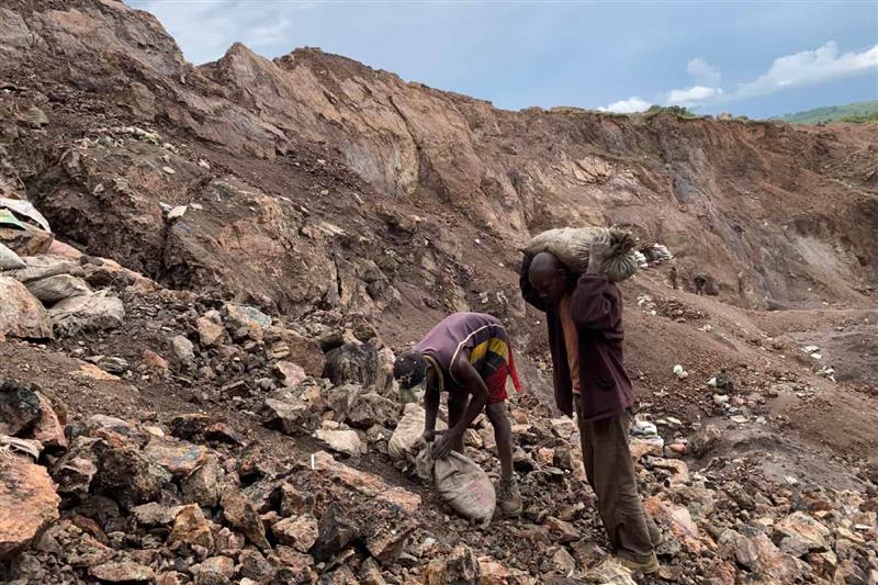 Two people work in a mine