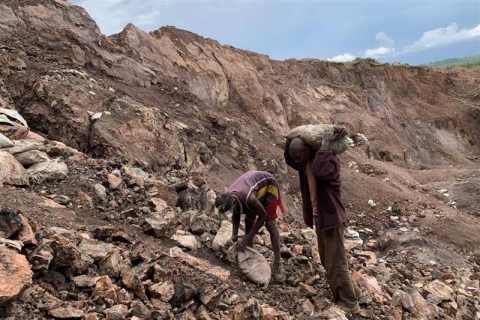 Two people work in a mine
