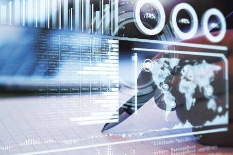 The image shows a hand interacting with a smartphone displaying digital financial and global data. The phone screen features complex graphs, charts, and a world map, creating a futuristic impression.