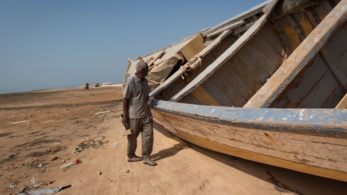 Drought, fisherman and a boat