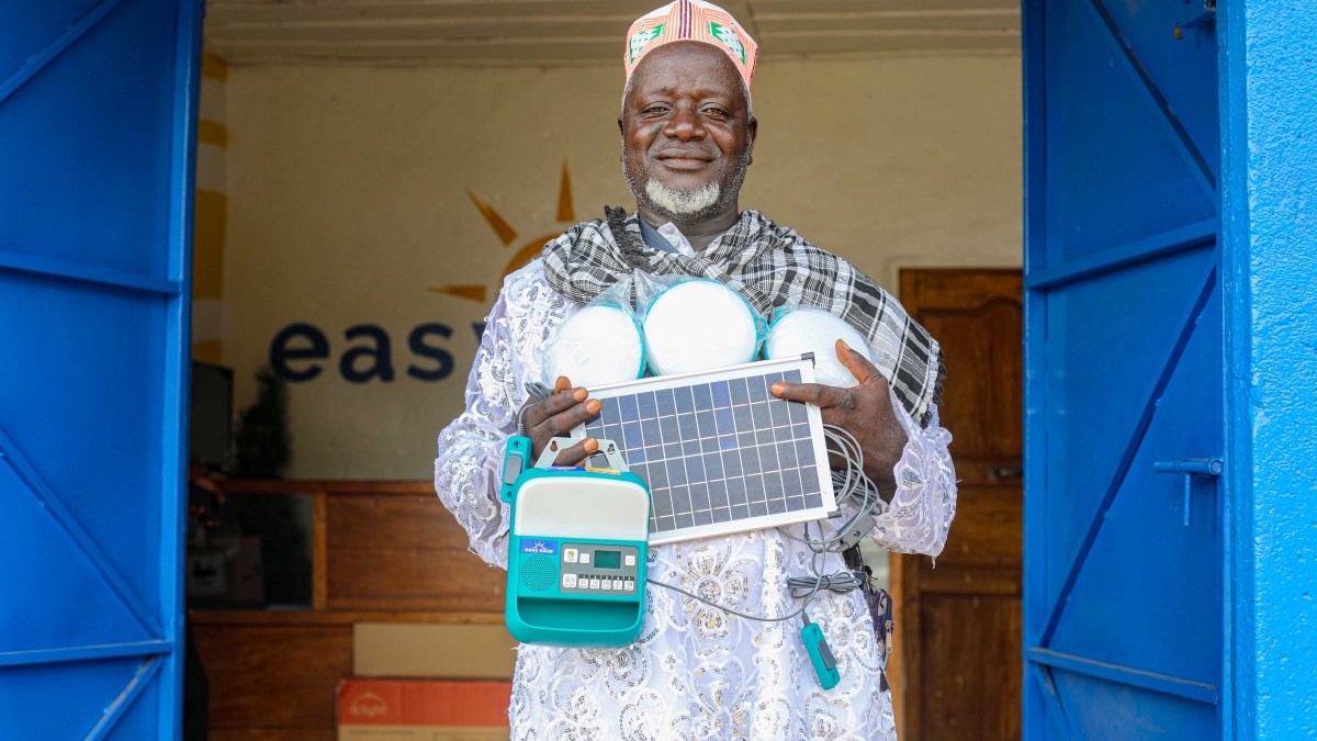 African man looks on proudly