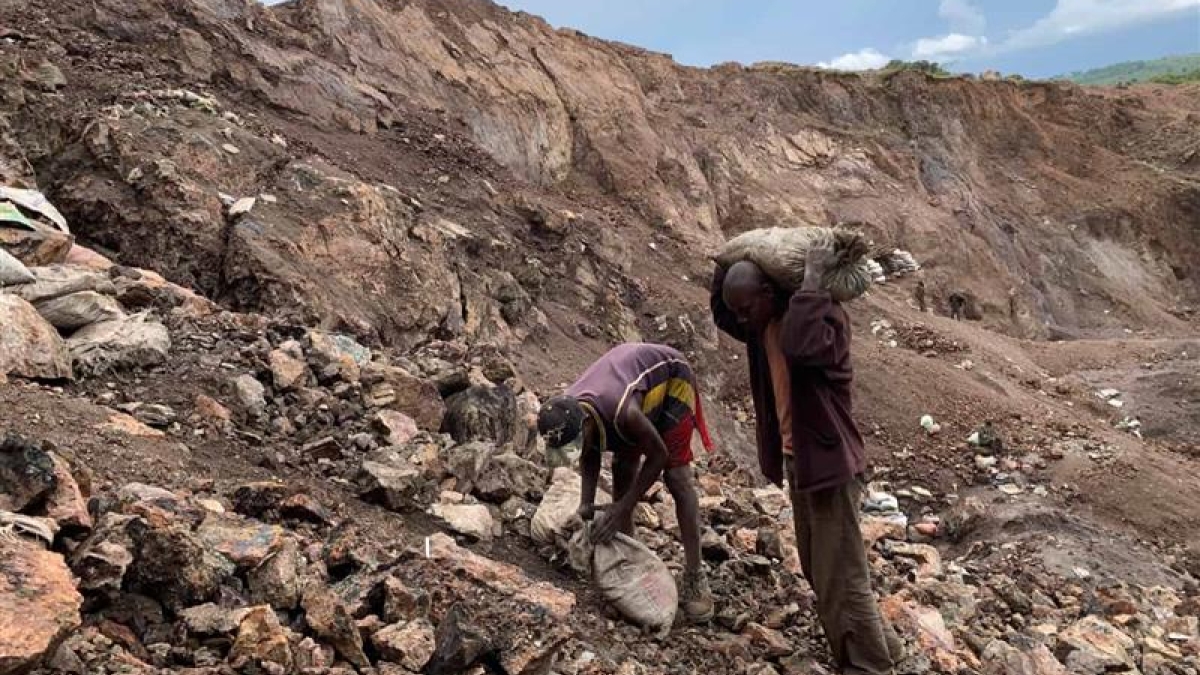 Two people work in a mine